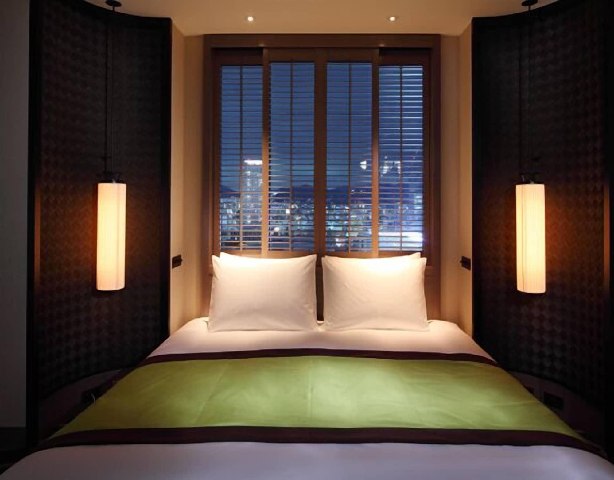 Oriental Hotel Kōbe Exterior foto A bedroom at the hotel